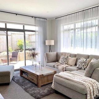 Sheer curtains on 25mm black rods