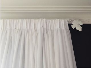 Pencil pleat curtains on 25mm rod